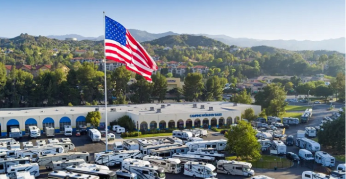 Camping World Stands Firm, Raises Giant American Flag Despite Local Officials’ Order To Remove It